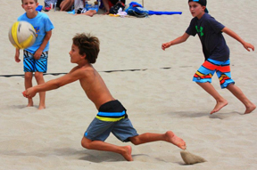 Jason Walmer keeps the ball – and the family tradition of beach volleyball – alive at the 15th annual BarryBob Invitational.