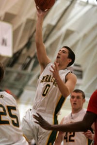 Elliott Ozer scores two of his game-high 25 points during Mira Costa’s quarterfinal loss to Pasadena. Photo by Ray Vidal