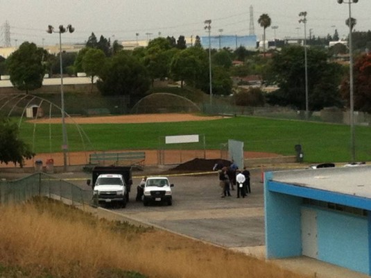 Police investigating the discovery of a dead body at Polliwog Park. Photo by Todd Anderson 