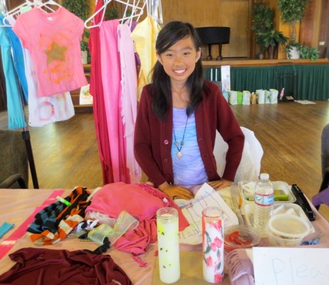 Ten-year-old Laura Hong shows off her merchandise. Photo 