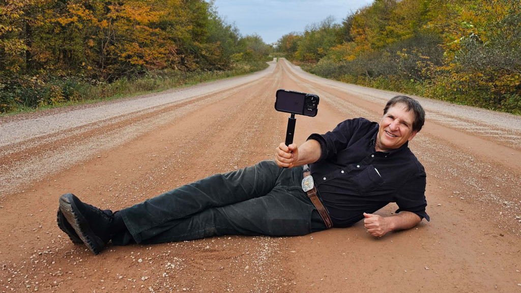Jefferson Graham hamming it up on a country road in Nova Scotia. Photo by Ruth Stroud